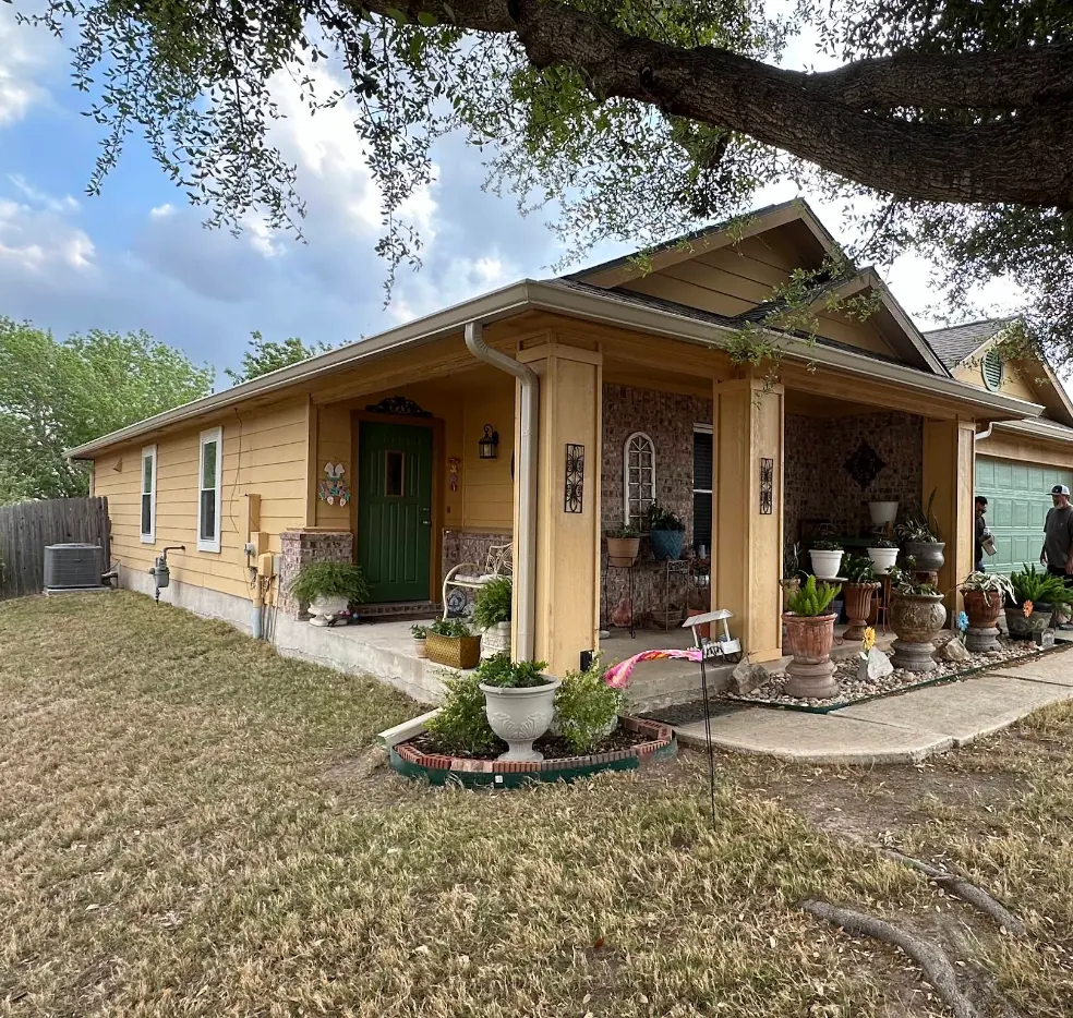 Seamless gutters and downspout on an established ranch-style home