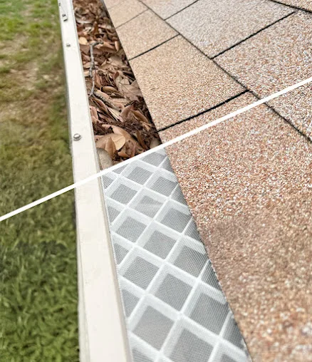 Gutter run above a covered patio