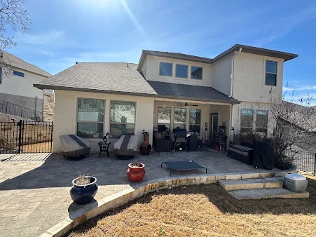 Seamless gutters on a home with a covered back patio