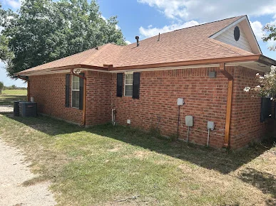 Seamless gutters on a brick ranch home